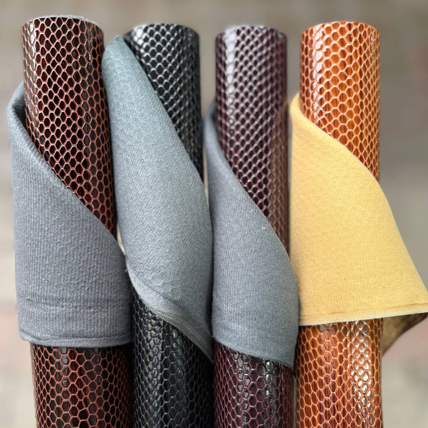 چرم مصنوعی ورنی پوست ماری ابر و بادی